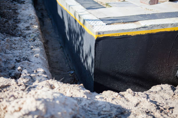 Professional Waterproofing technician working in Kelleys Island, OH
